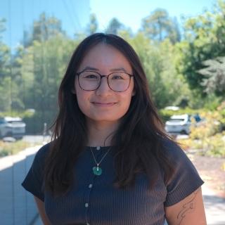 Portrait of Izzy Vo, Program Manager